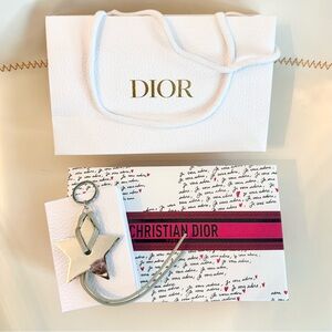 Dior Metallic Star Keychain, Valentine’s edition box and Dior shopping bag.